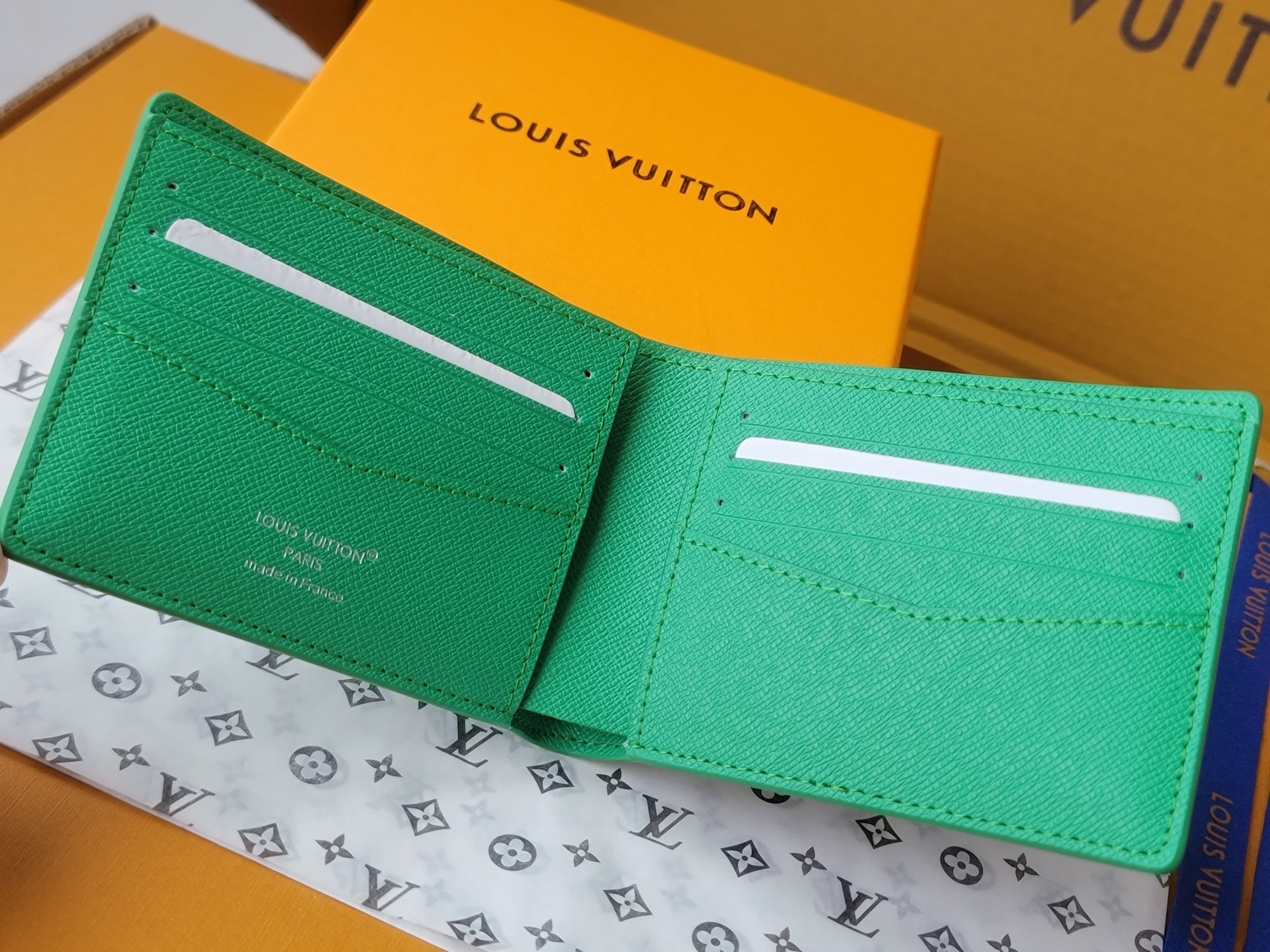 LV Multiple Wallet Featuretiny Sport Scenes Printed Cowhide