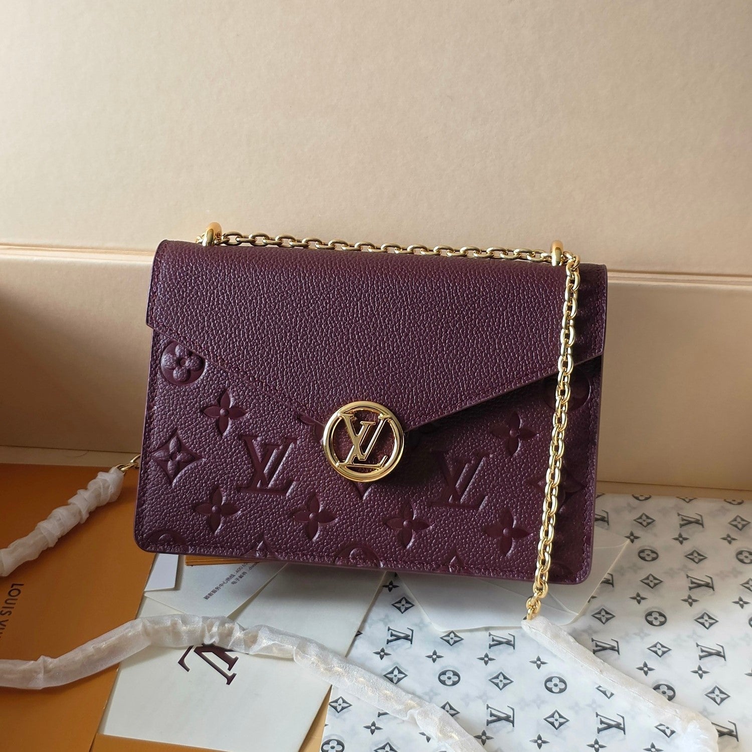 LV Wallet On Chain Rosy Grenat Red Embossed Grained Cowhide Leather