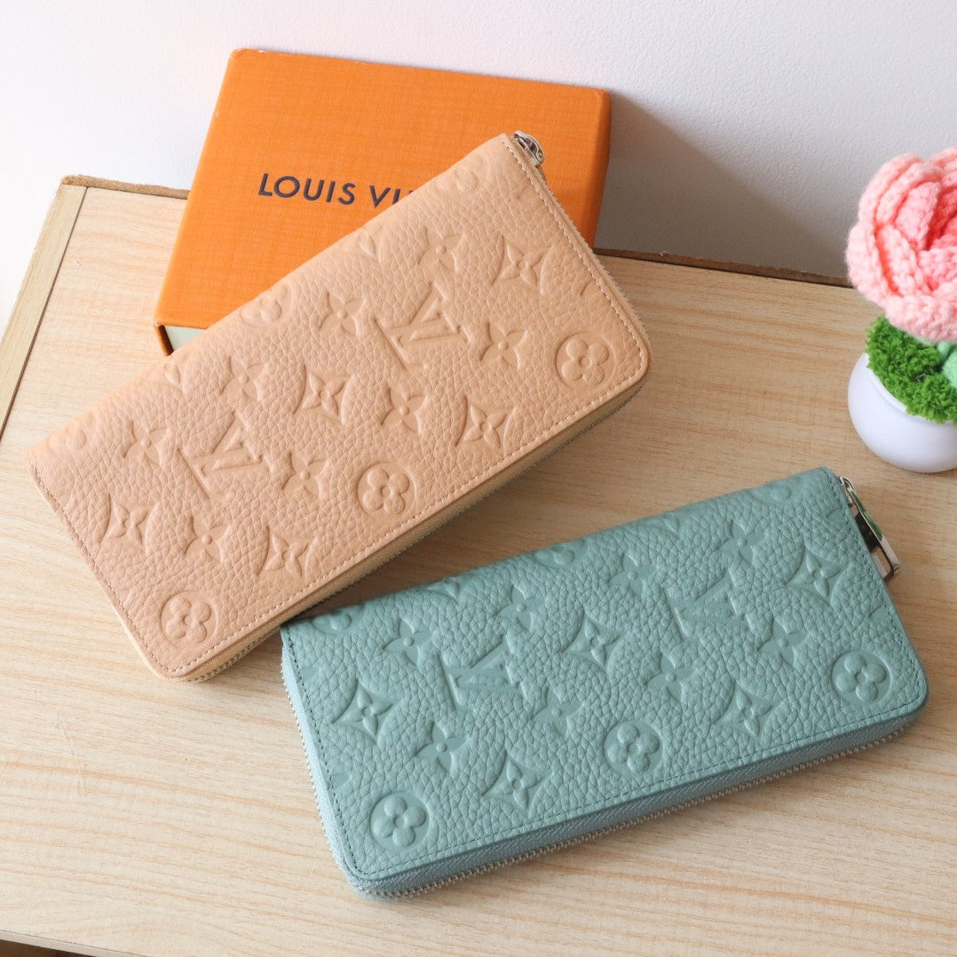 LV Zippy Wallet Vertical Monogram Grained Taurillon Cowhide